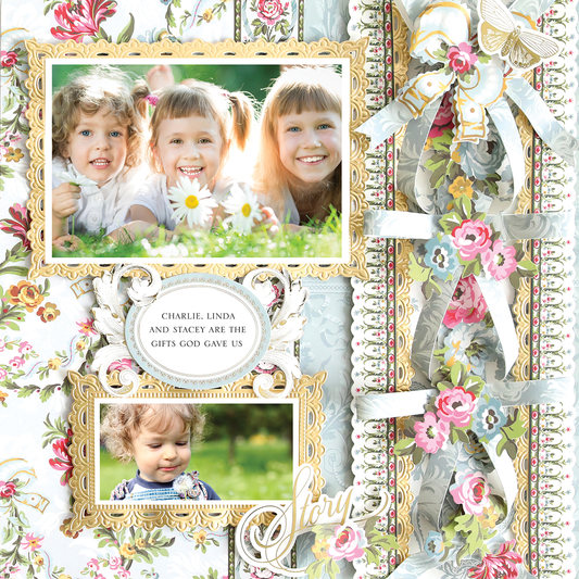 Three smiling children lie on grass above a framed photo of a toddler with floral and lace accents. Text reads, “Charlie, Linda and Stacey are the gifts God gave us.” Displayed on a 12x12 Scrapbook Page Phoebe Paper Bow Right.