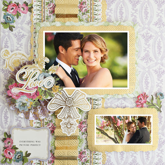 The 12x12 Scrapbook Page Phoebe Purple Left features two framed wedding photos of a smiling couple, floral embellishments, the word "Love" in cursive, and a plaque that says "Everything was picture perfect.