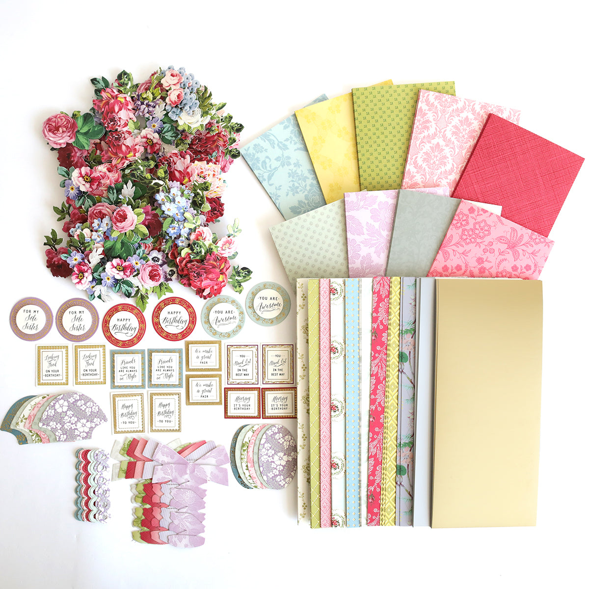 Assorted Paper Sneakers Refill Kit including patterned papers, stickers, 3D sentiments, and decorative elements arranged in layers on a white background.