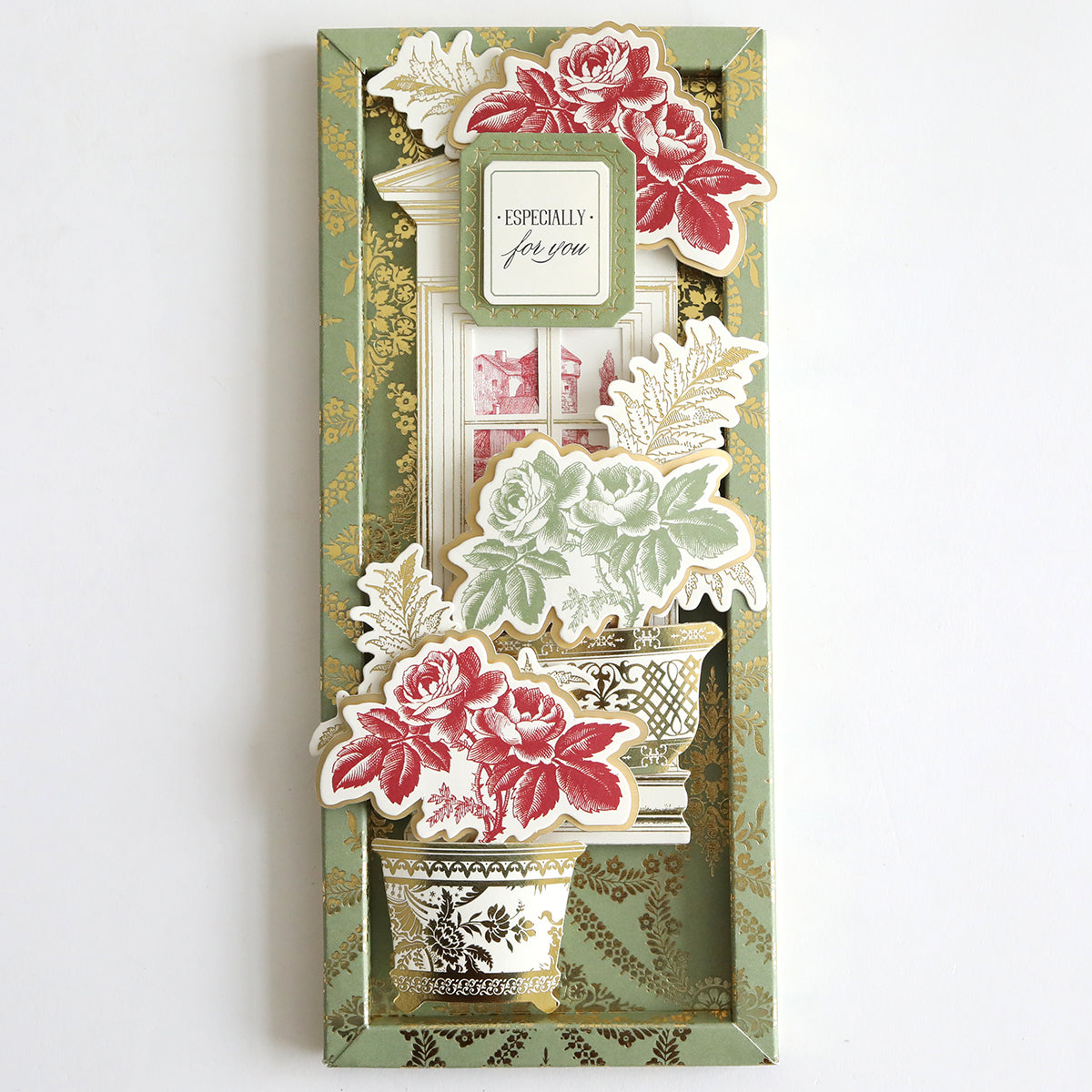 A decorative card made from Toile Doublesided 300gsm Cardstock, featuring potted flowers in red, green, and black, with an "Especially for you" label on a patterned green and gold background.