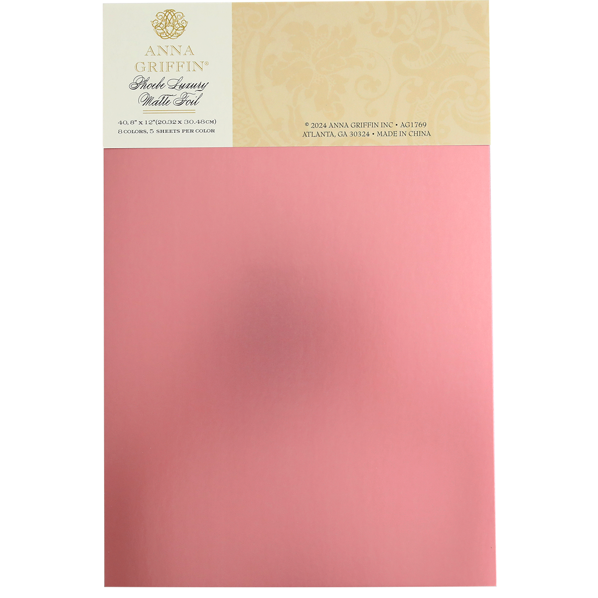 A package of Phoebe Luxury Matte Foil Cardstock 8x12 in pink, perfect for luxurious crafting projects, featuring the product's branding and details on the top part of the packaging.