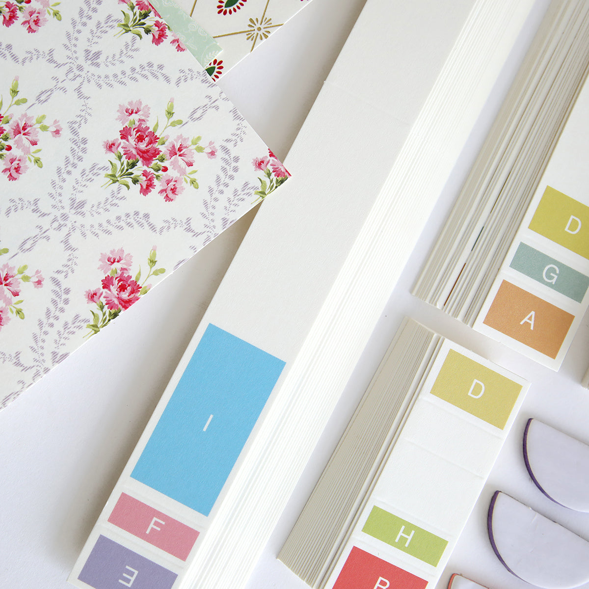 A variety of Anna Griffin's Pulley Honeycomb and Card Supplies are laid out on a table.