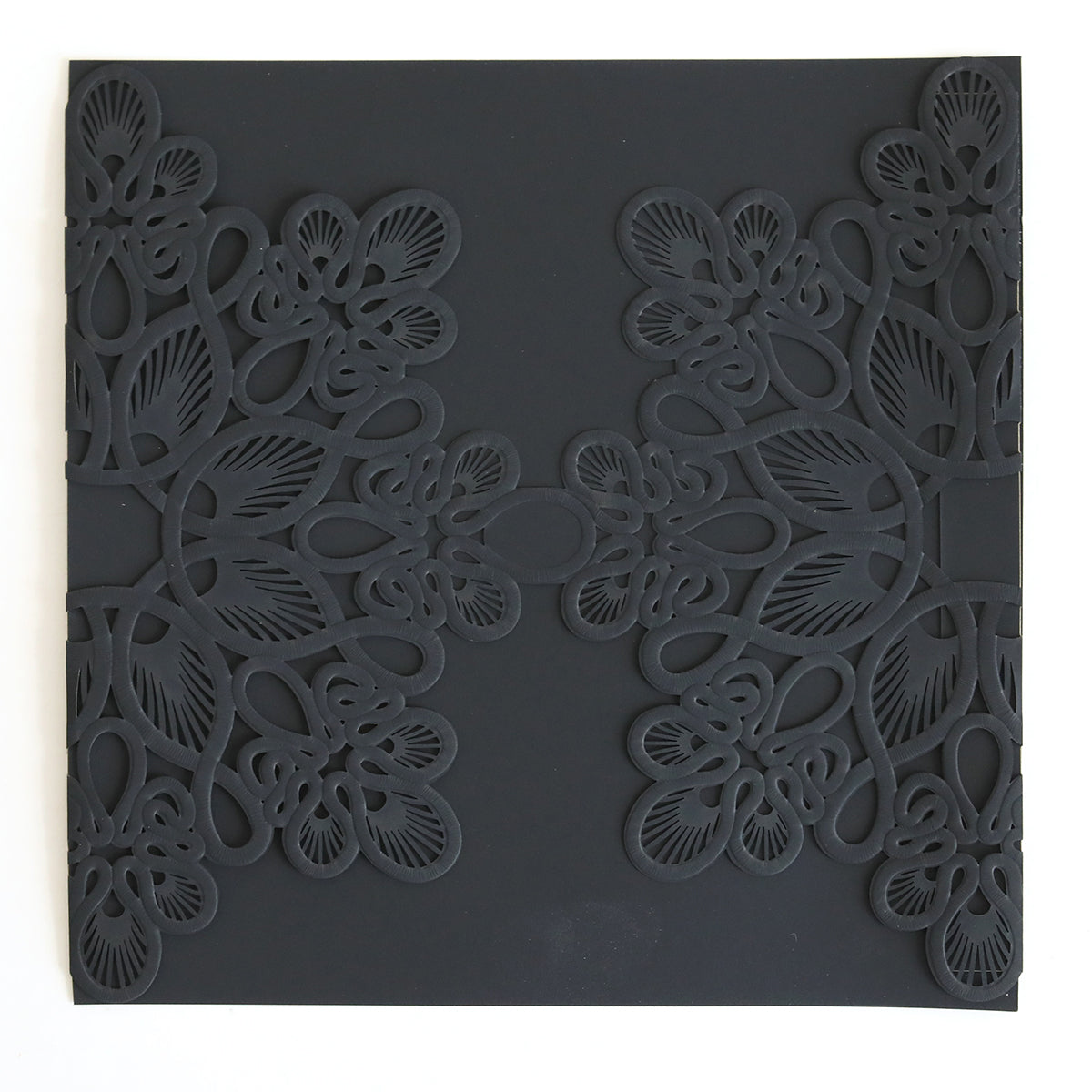 The Black Triangle Lace Band 10 pack features square black paper with symmetrical, intricate cut-out floral and leaf designs on both sides—perfect for sophisticated wedding or custom invitations.