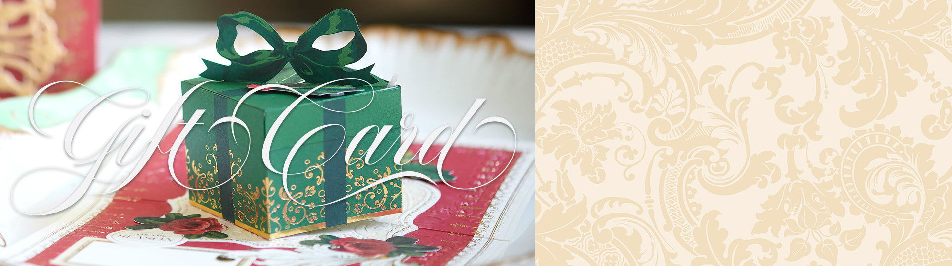 A decorative green gift box with a bow sits on a red and white card. The words "Gift Card" are elegantly written over the image.