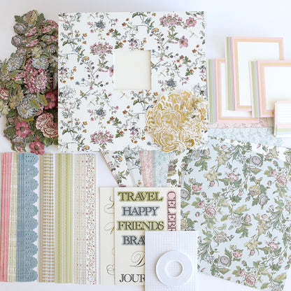 A collection of scrapbooking essentials including patterned papers from the Simply Wildflower Meadow Scrapbook Kit, floral embellishments, and decorative frames on a white background.