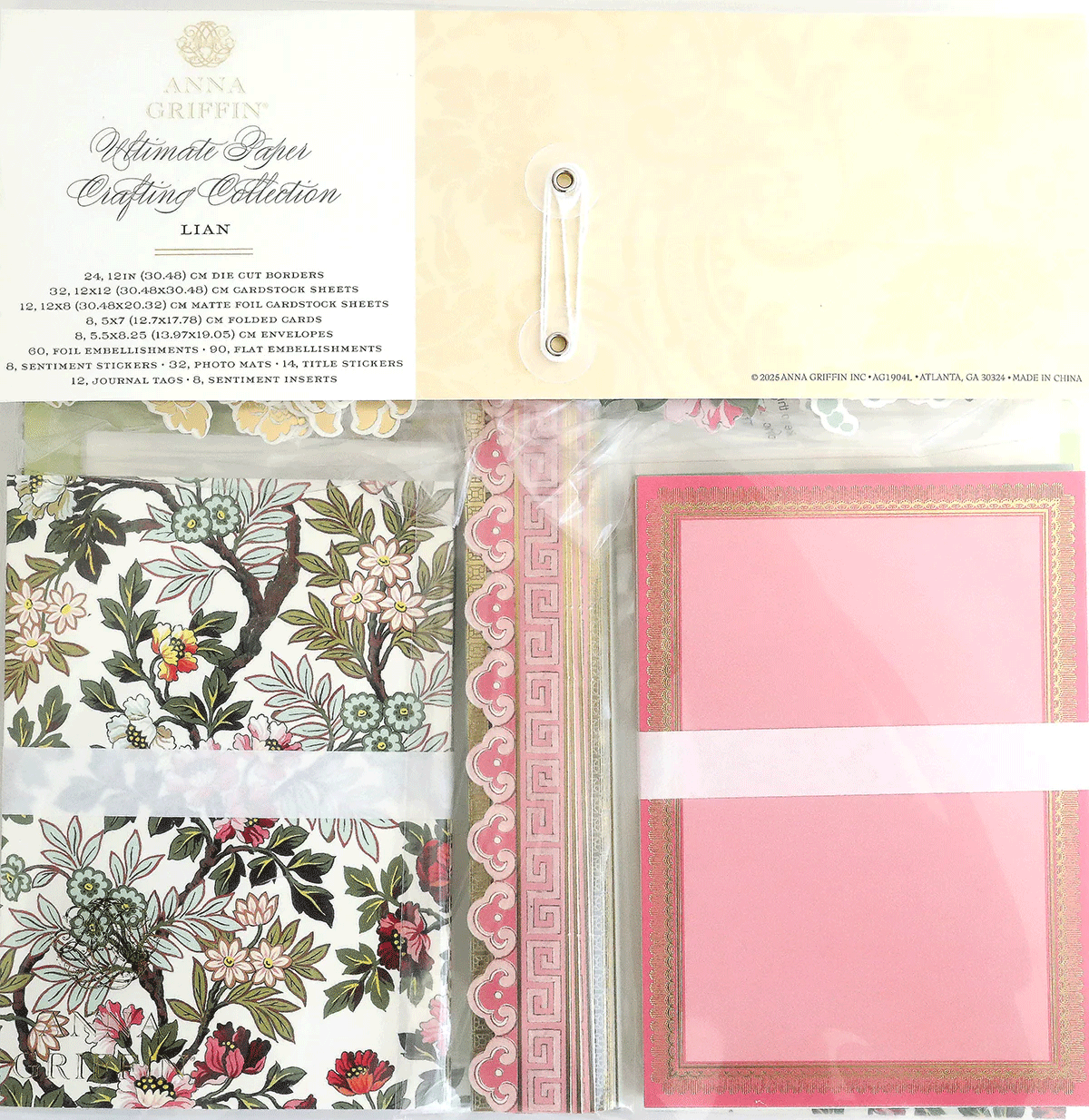 The Fanmail Friday Lian Paper Dress Bundle features decorative floral and pink patterned cardstock, card borders, and coordinating embellishments, all packaged in clear plastic.