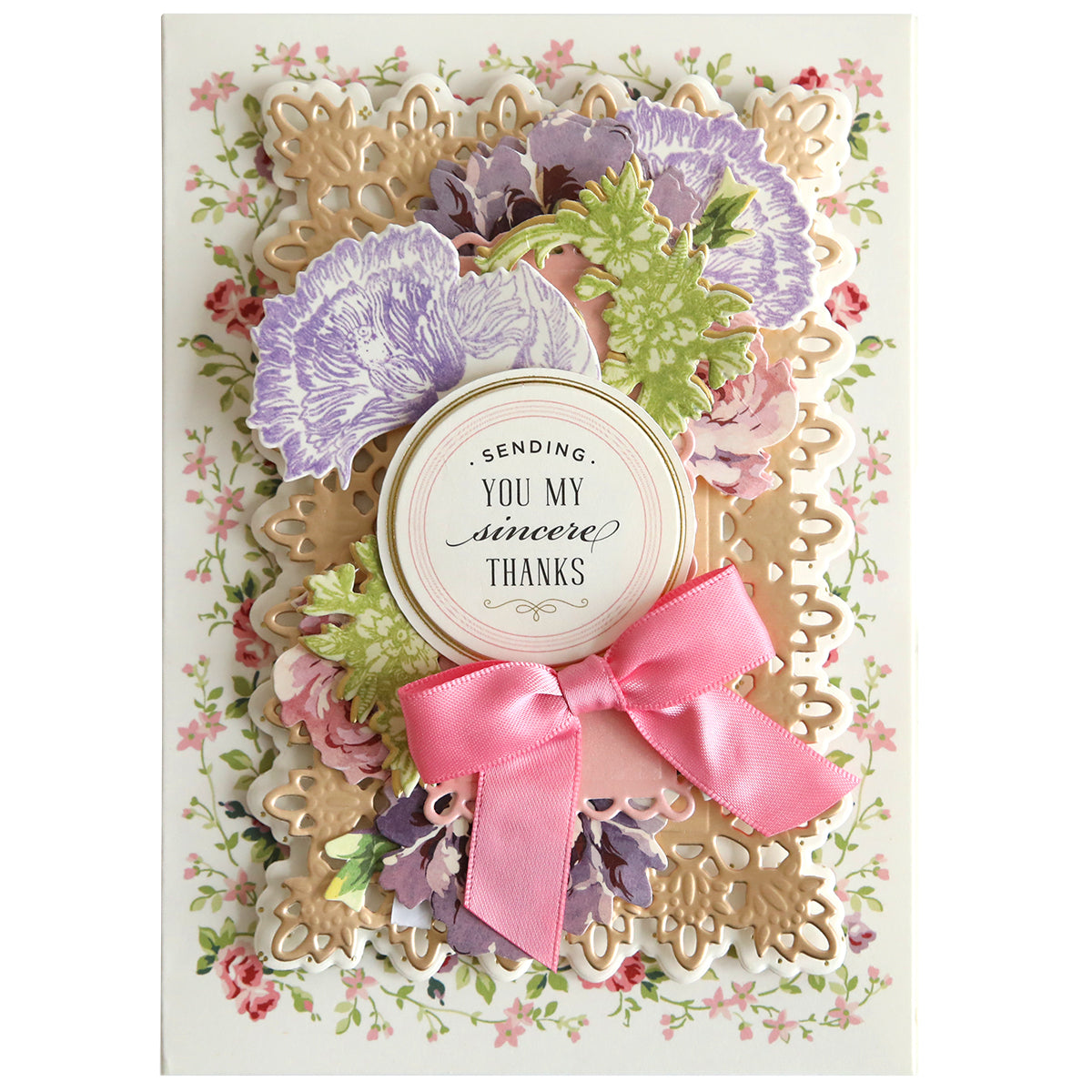 An ornate thank-you card decorated with Wildflower Meadow stamps, a pink ribbon, and a message reading "sending you my sincere thanks".