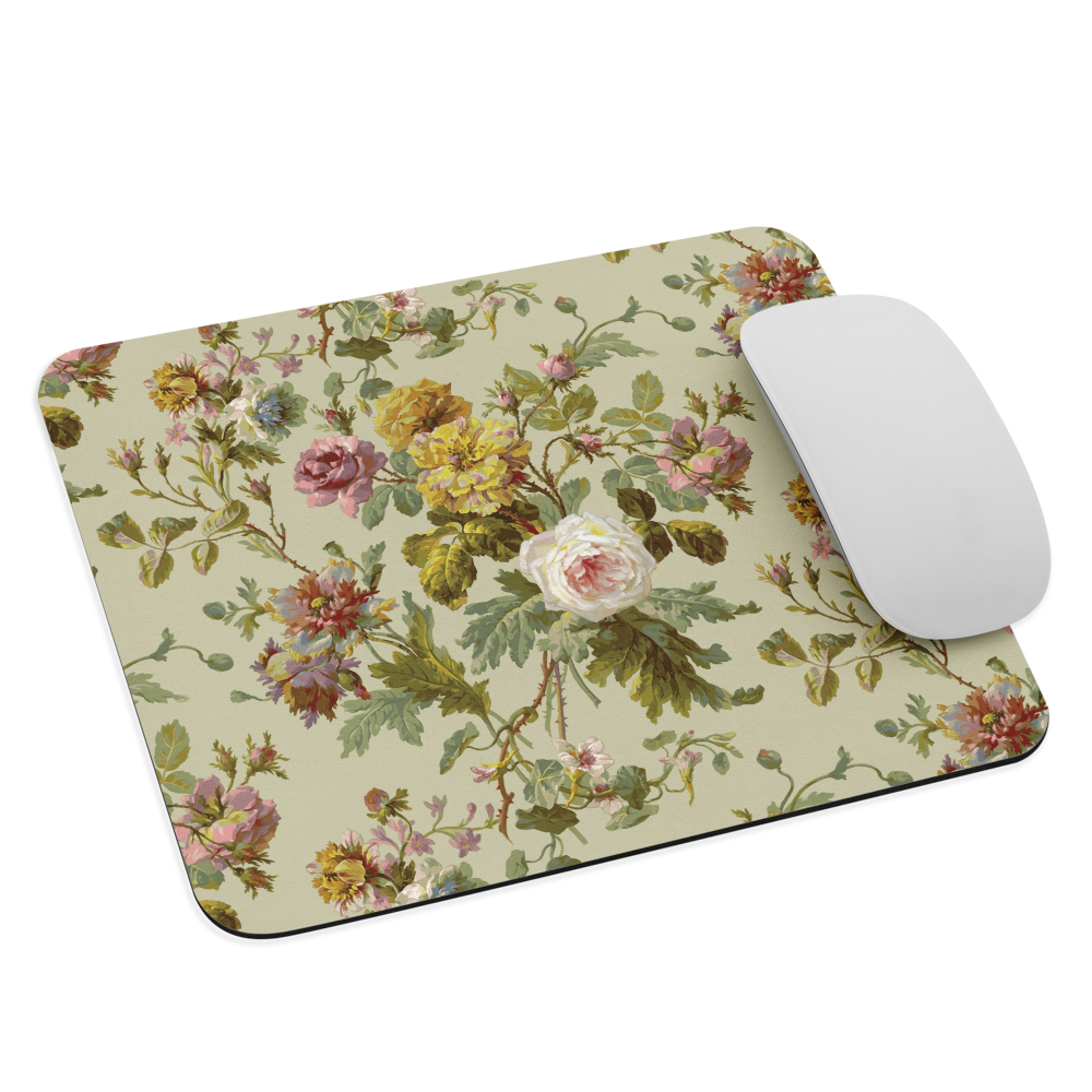 Floral mouse pad with supreme grip and easy mouse movement, featuring pink, yellow, and white flowers with green leaves. Comes with a stylish white computer mouse.