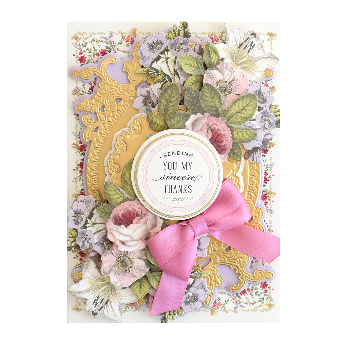 a close up of a card with flowers.