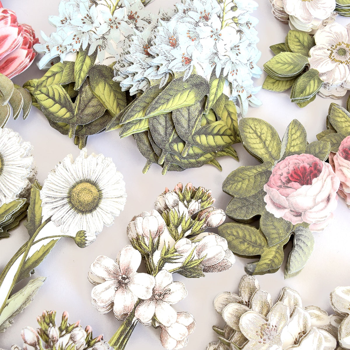 a bunch of flowers that are on a table.