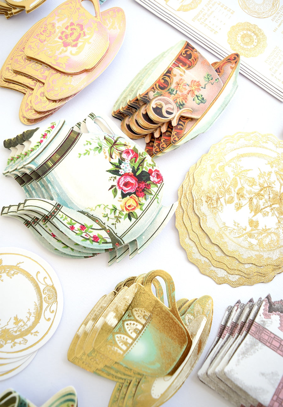 a table topped with lots of plates and plates.