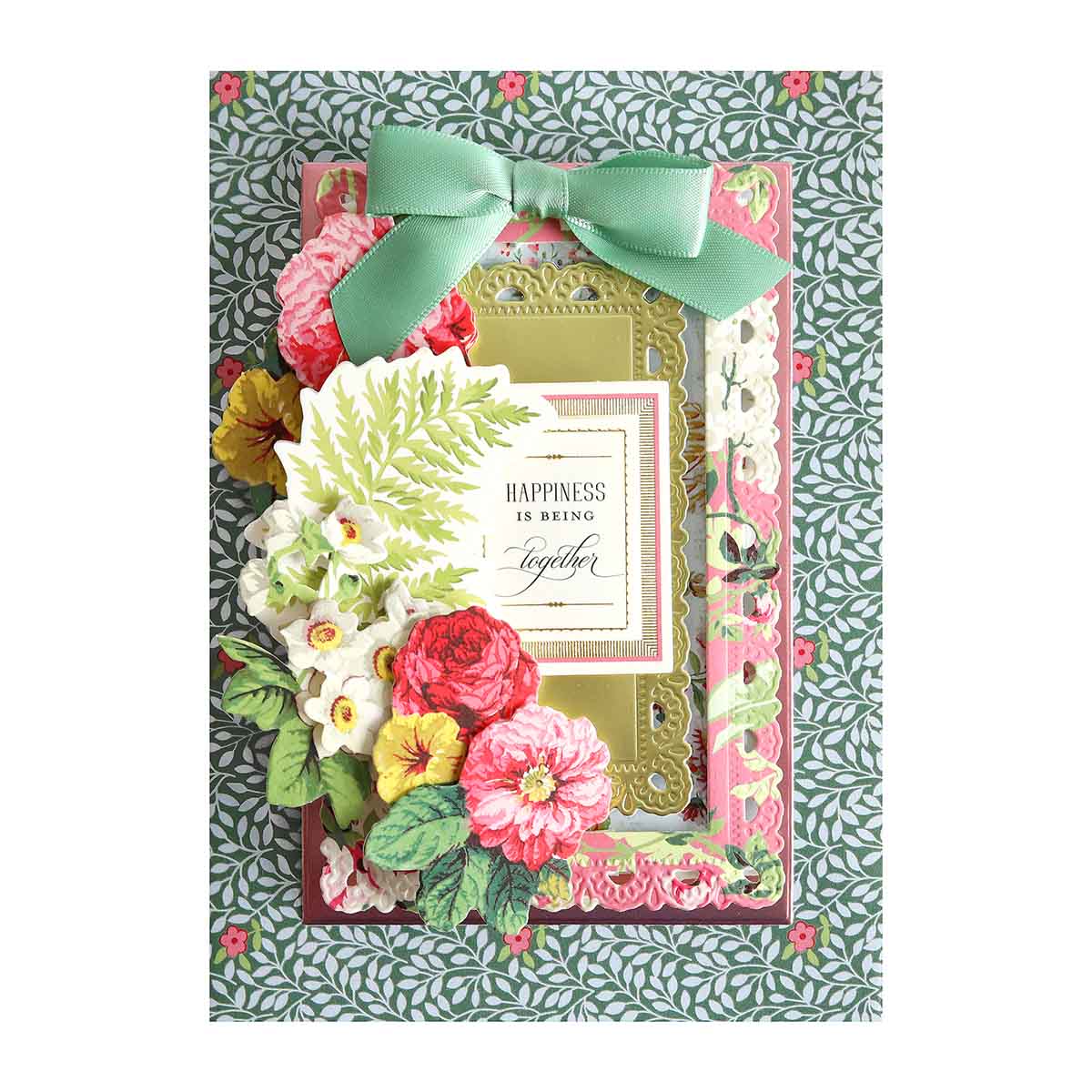 a card with flowers and a bow on it.