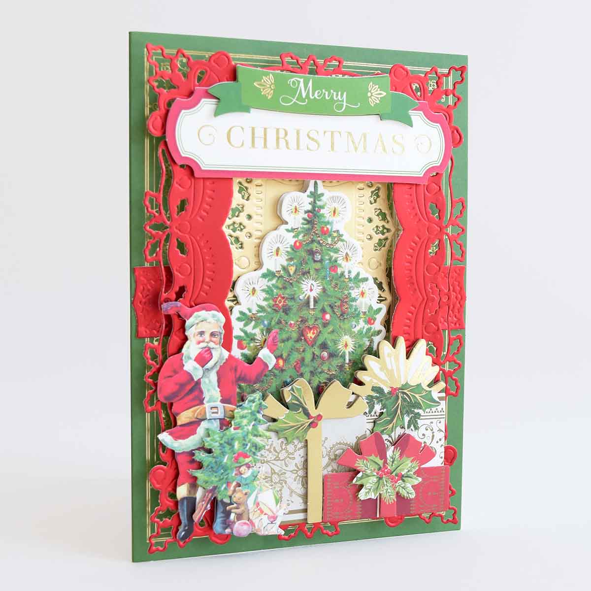 a christmas card with a santa clause and a christmas tree.