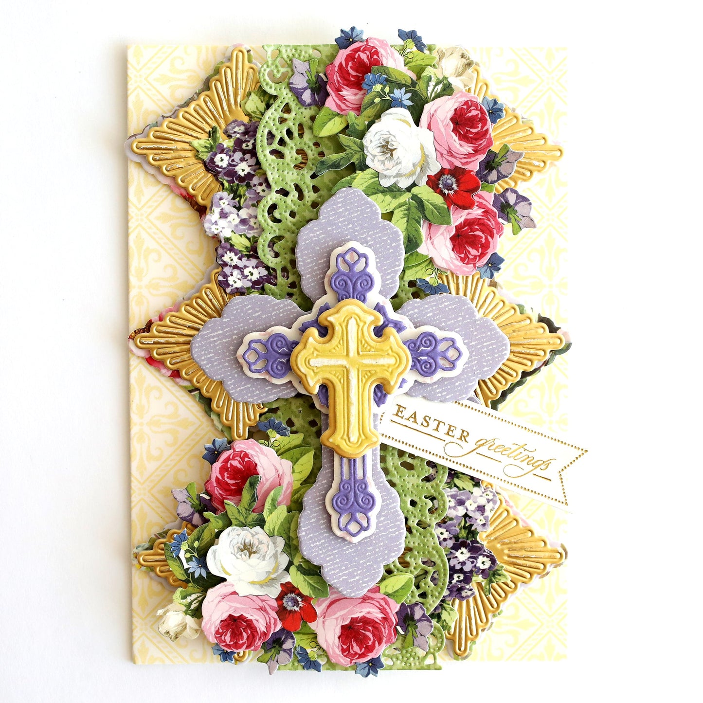 a card with a cross and flowers on it.