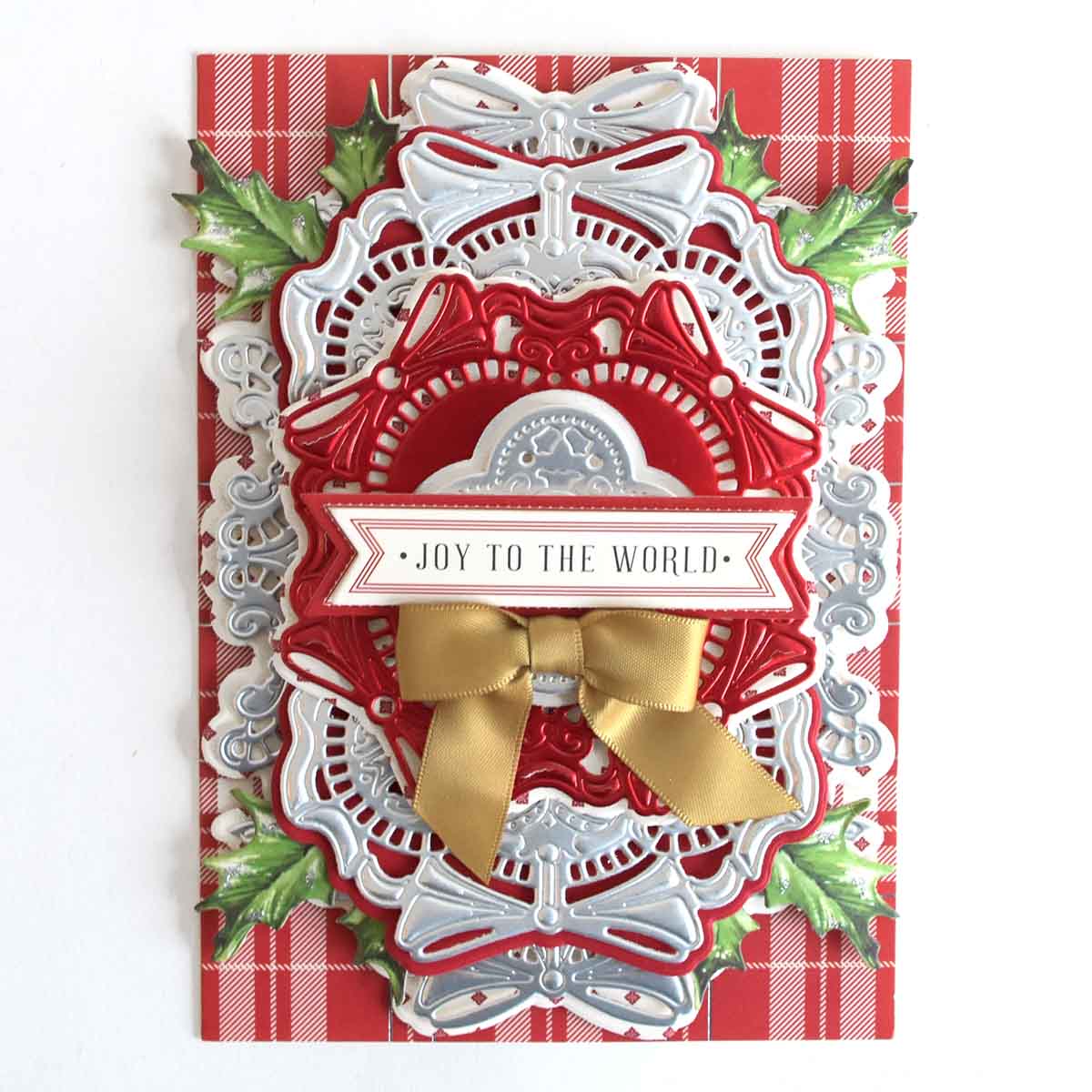 a red and white christmas card with a bow.