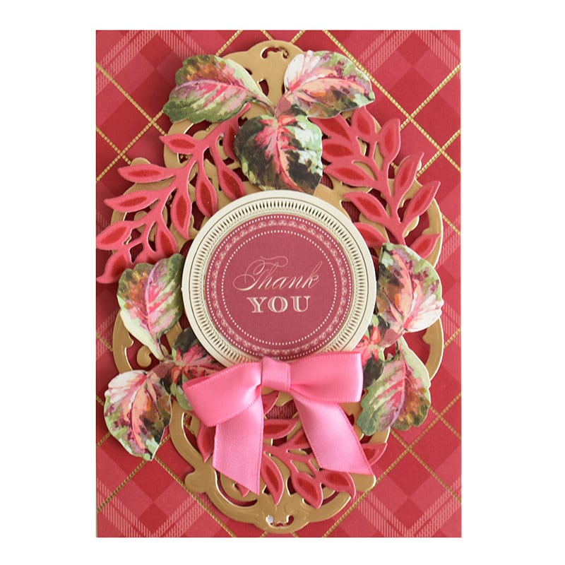 a close up of a card with a bow.