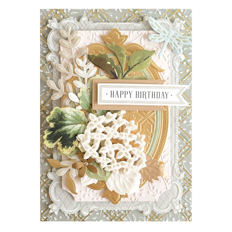 a close up of a birthday card with flowers.