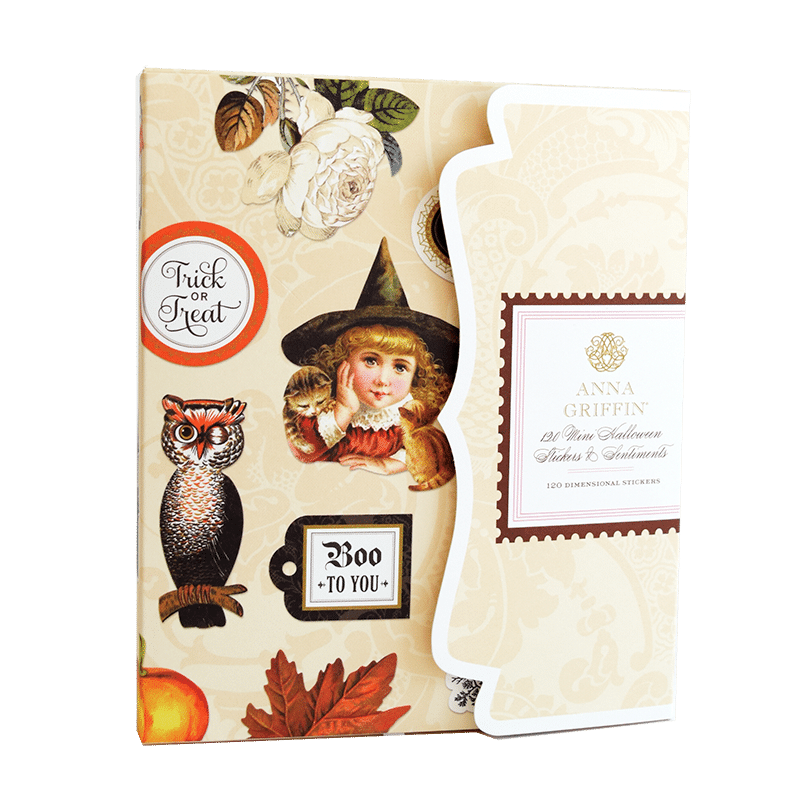 a card with a picture of an owl and a witch on it.
