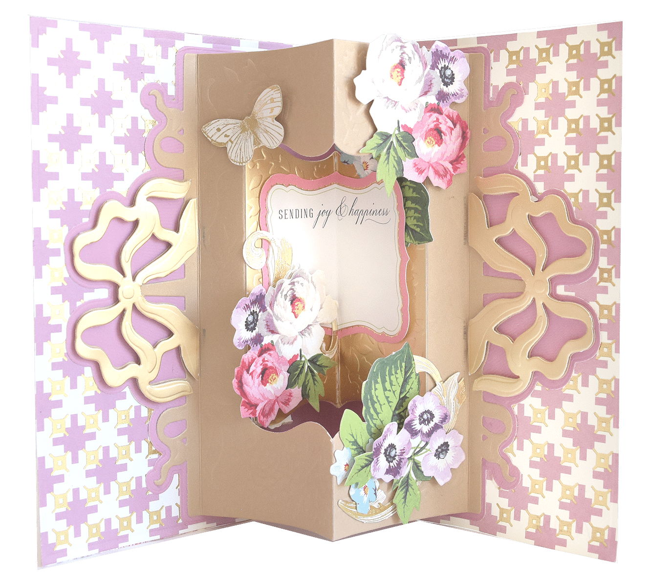 an open card with flowers and butterflies on it.