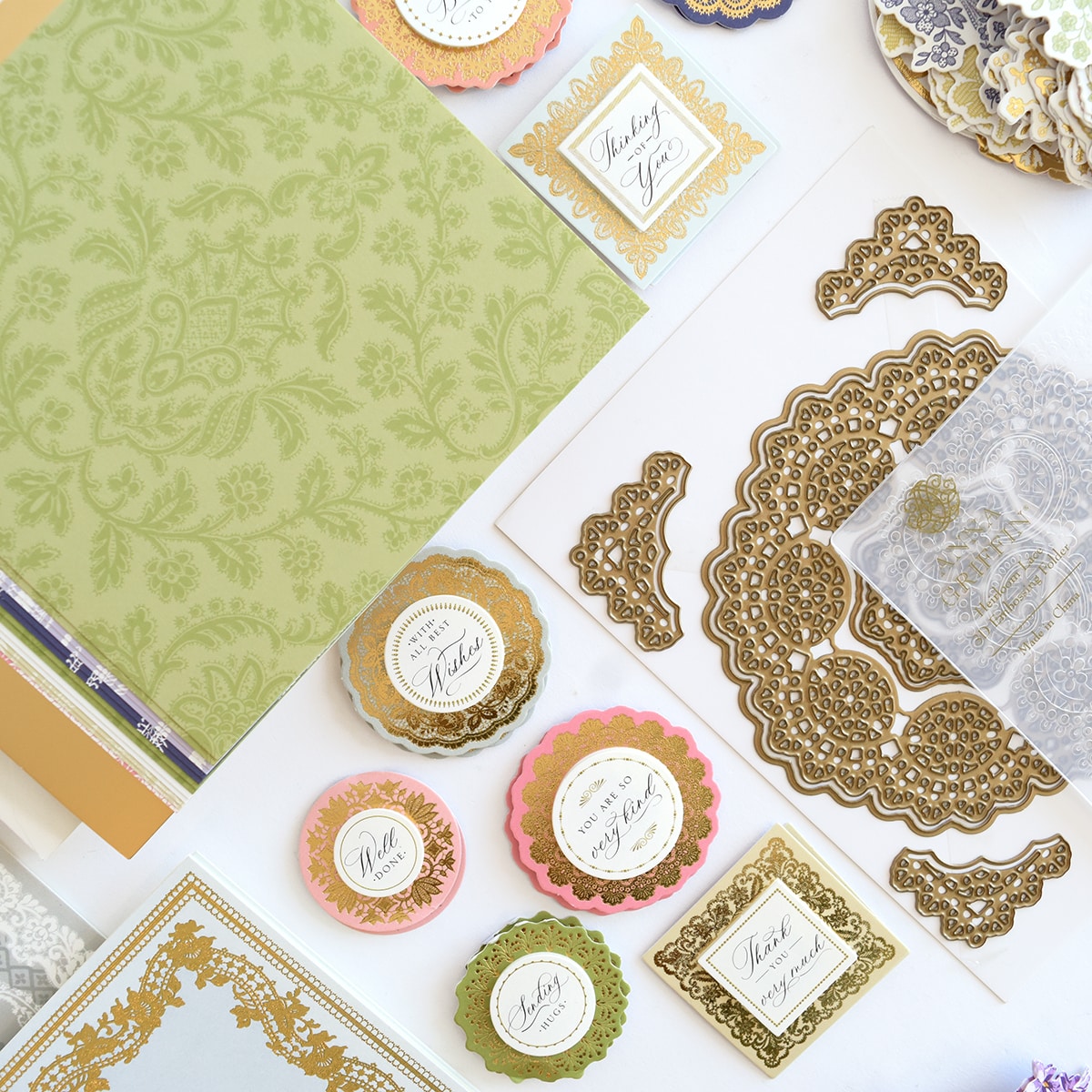 a table topped with lots of different types of paper.