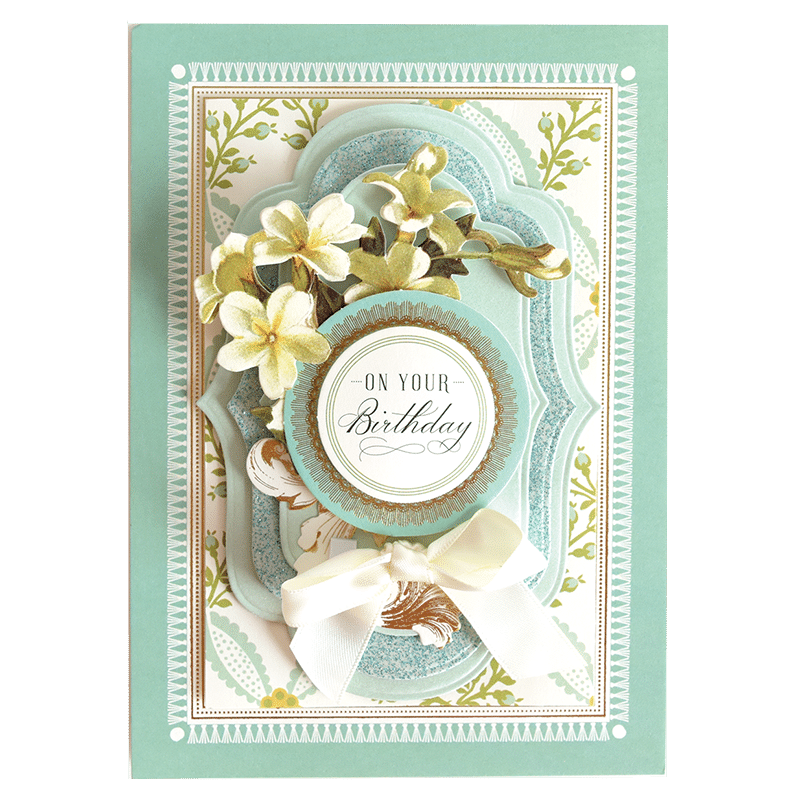 a birthday card with flowers on it.