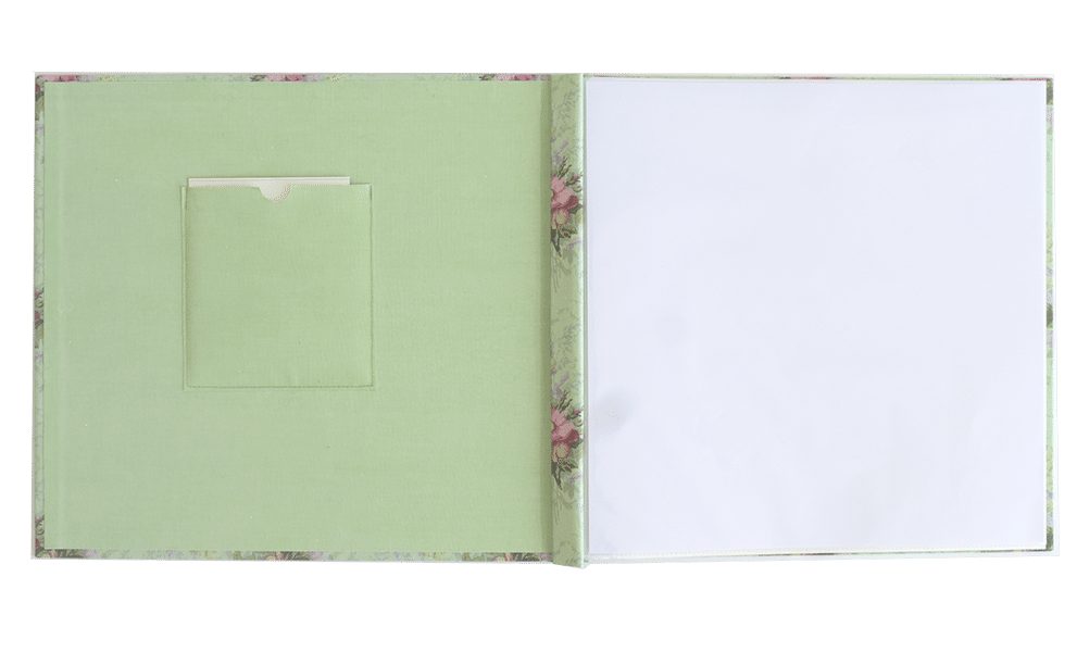 an open book with a picture of flowers on it.