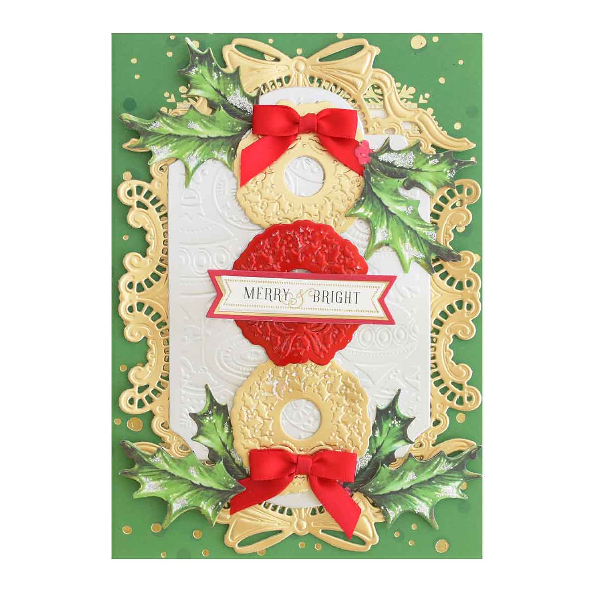 a christmas card with cookies and holly.