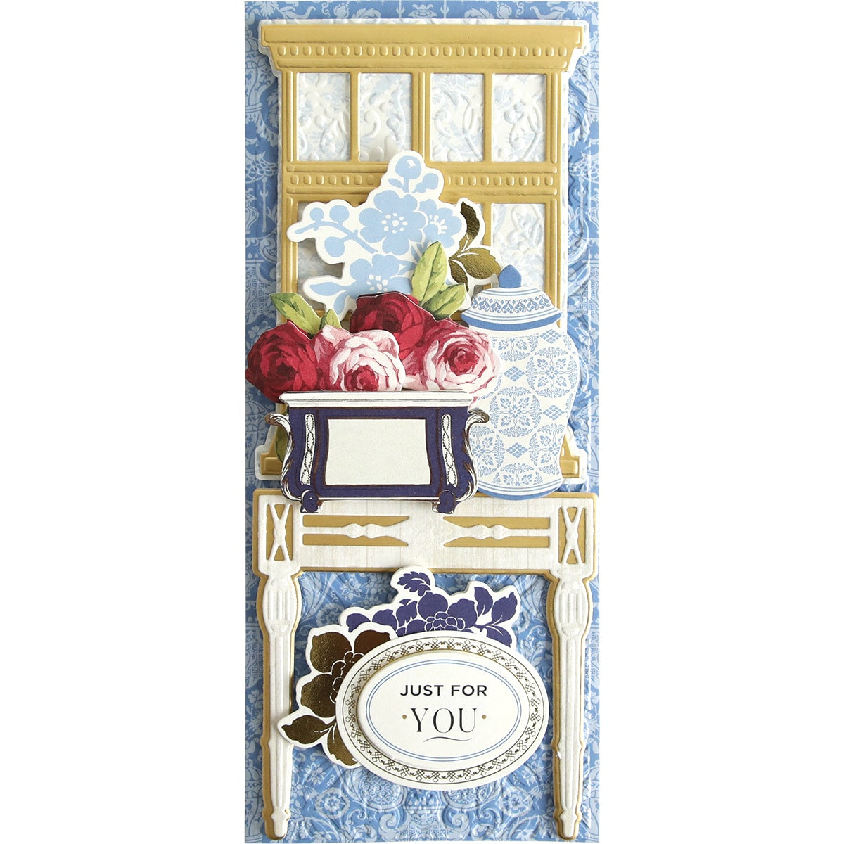 a blue and white card with flowers in a vase.