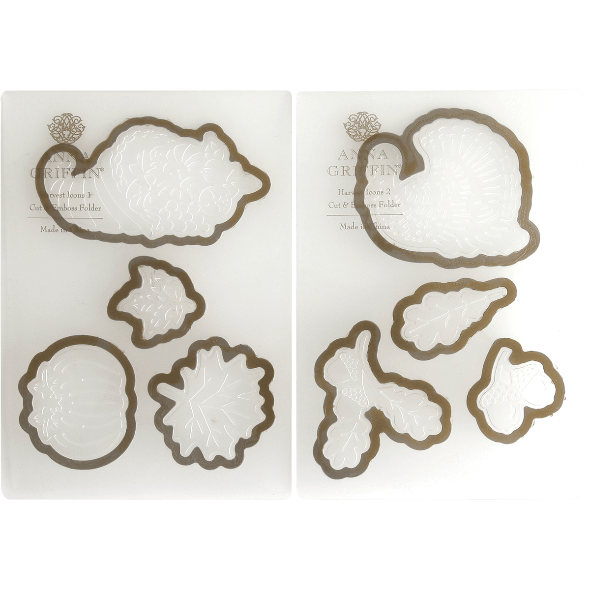 a couple of cookie cutters sitting on top of a white plate.