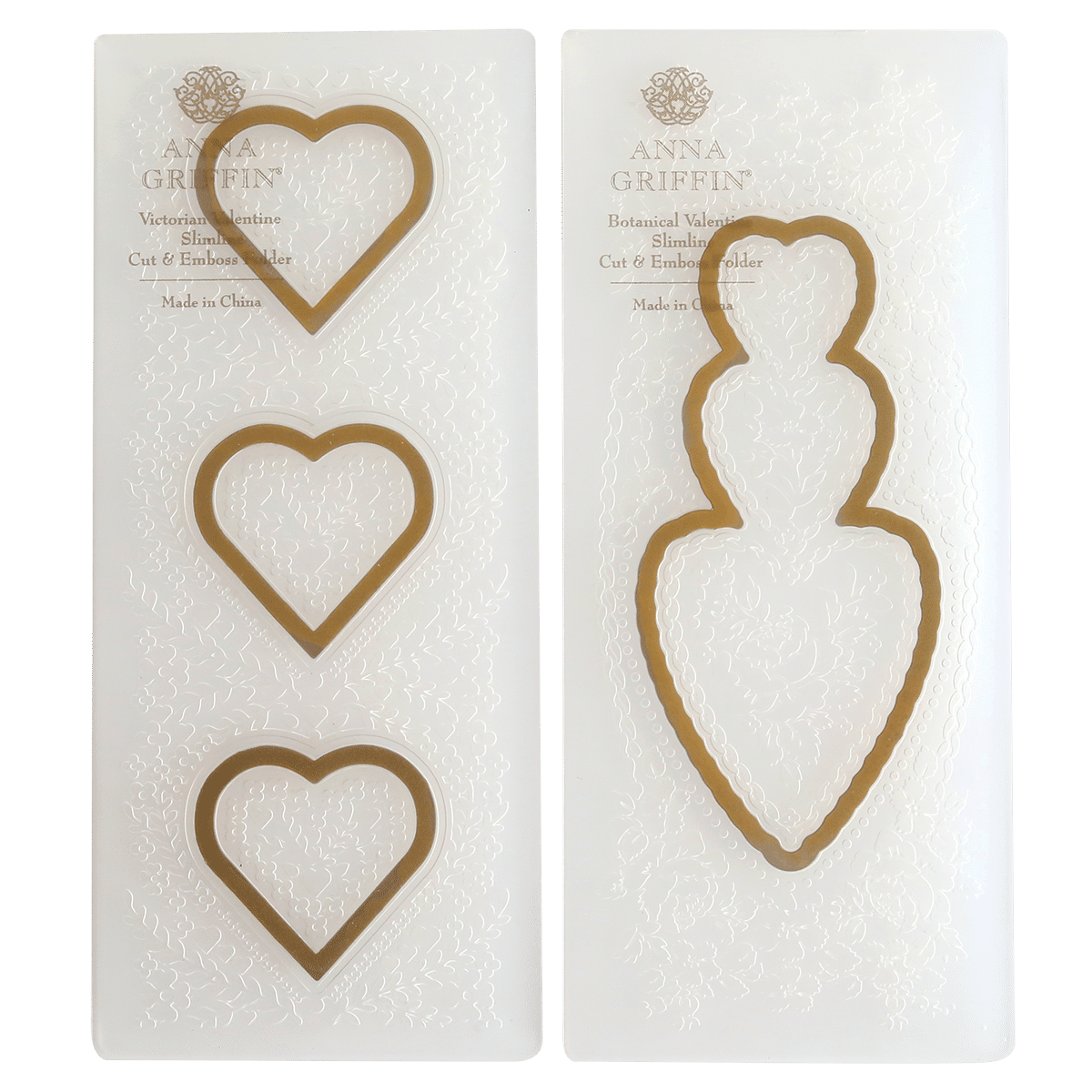 a pair of heart shaped cookie cutters sitting on top of each other.