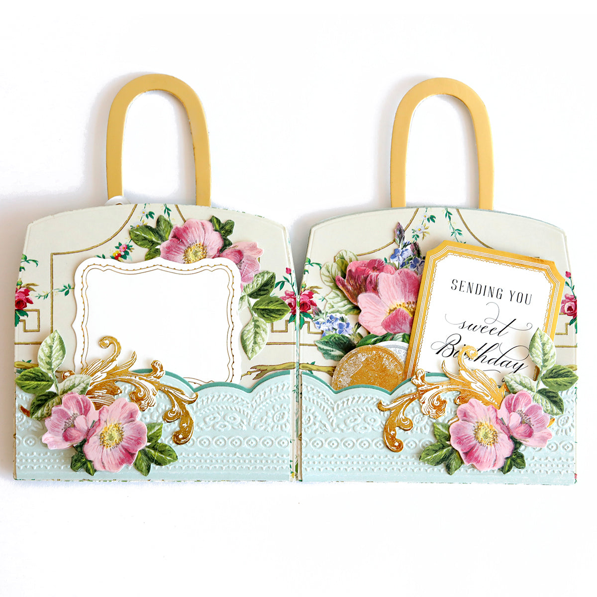 a couple of tags with flowers on them.
