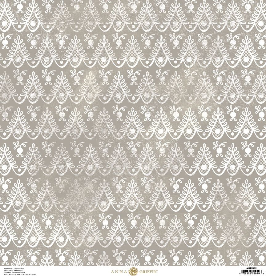 a white lace pattern on a gray background.