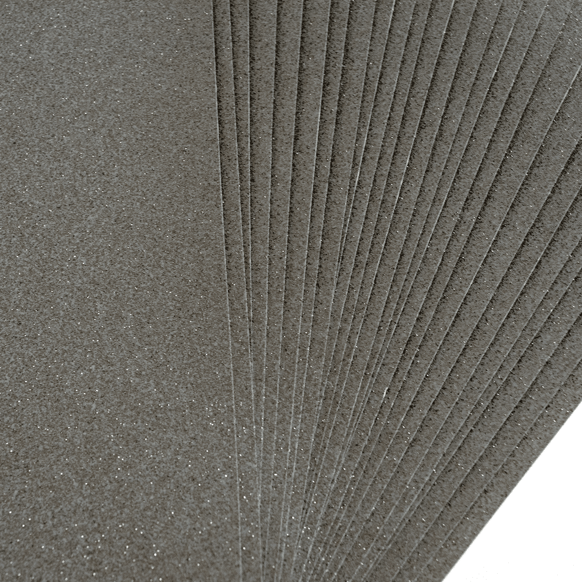 a bunch of gray paper stacked on top of each other.