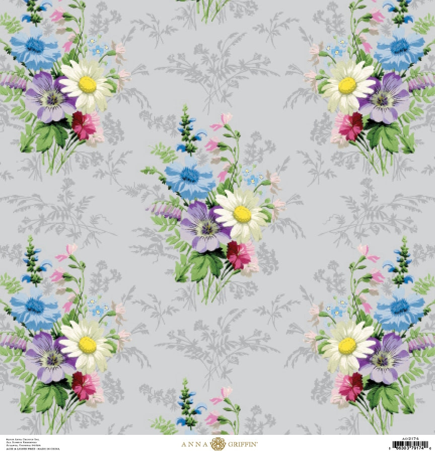a bouquet of flowers on a gray background.