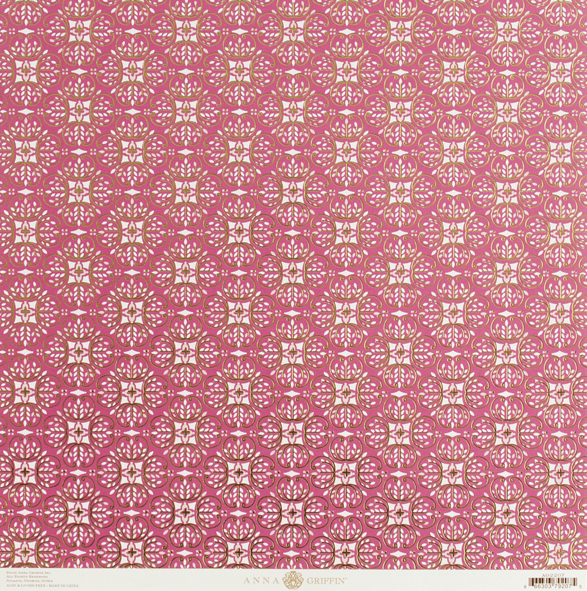 a pink and white wallpaper with a pattern on it.