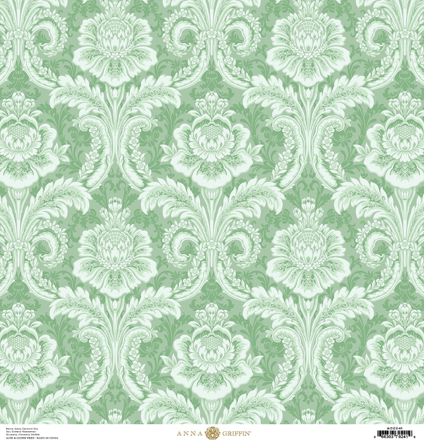 a green and white wallpaper with a floral design.