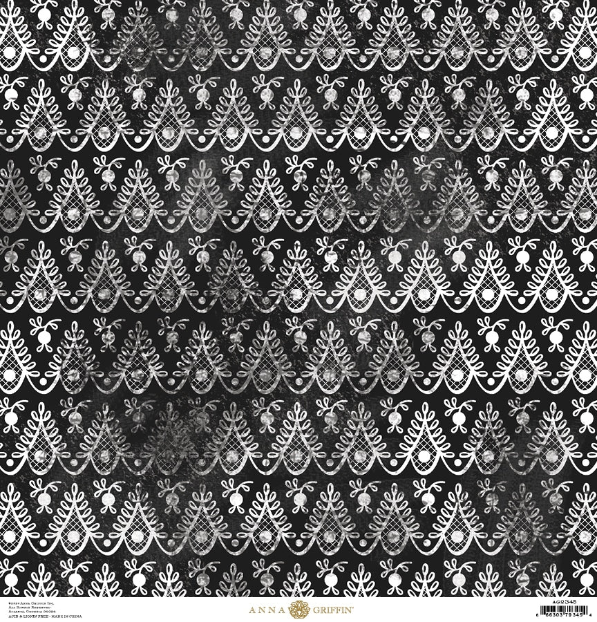 a black and white pattern with white flowers.