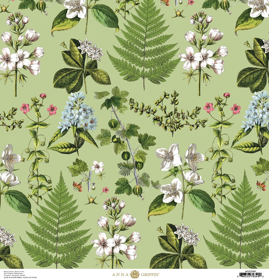 a green background with white flowers and green leaves.