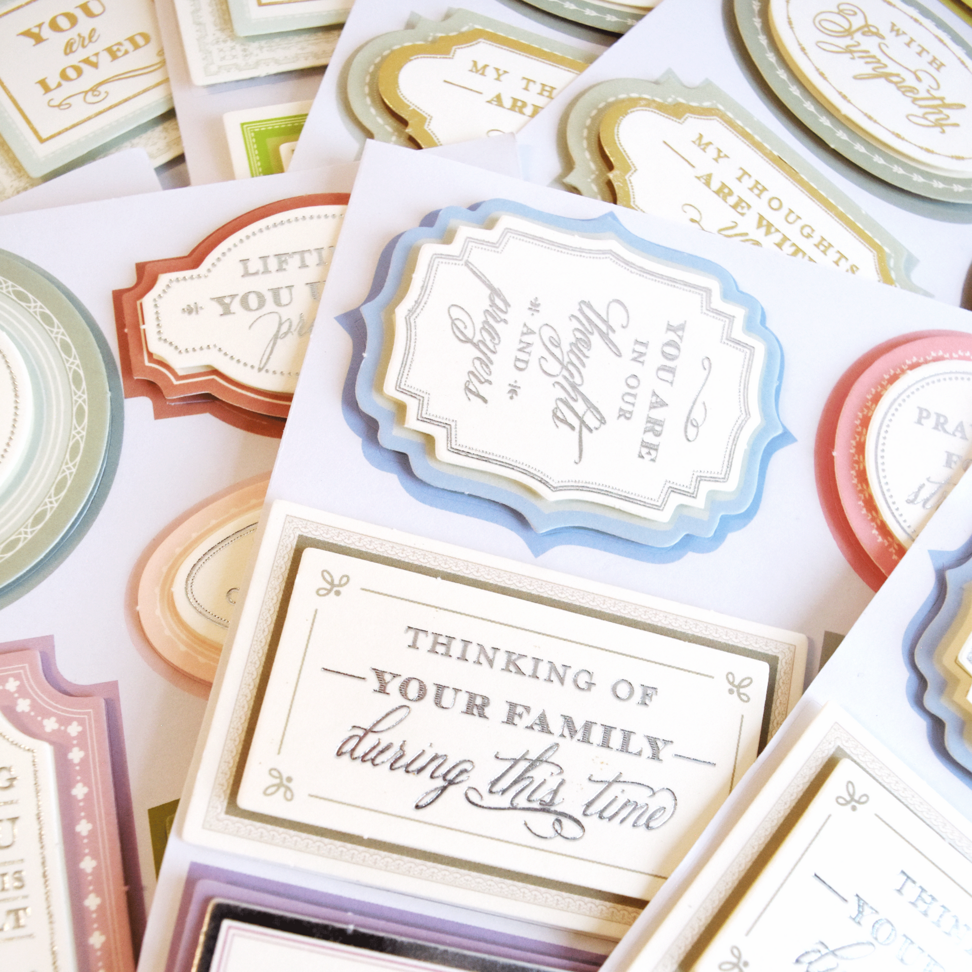 a pile of different types of business cards.