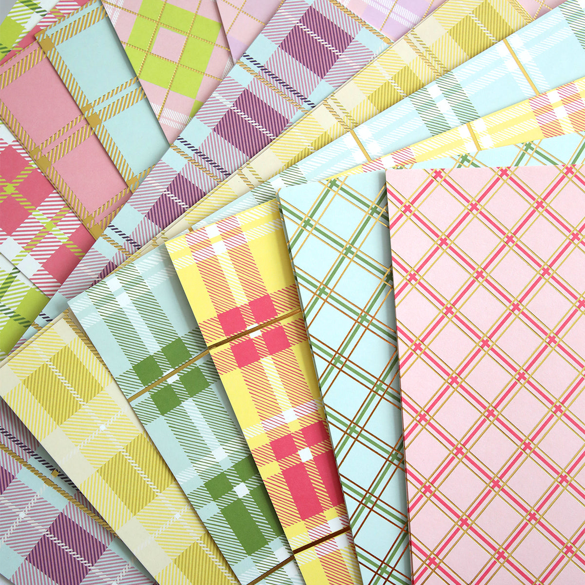 a bunch of different colored papers on top of each other.