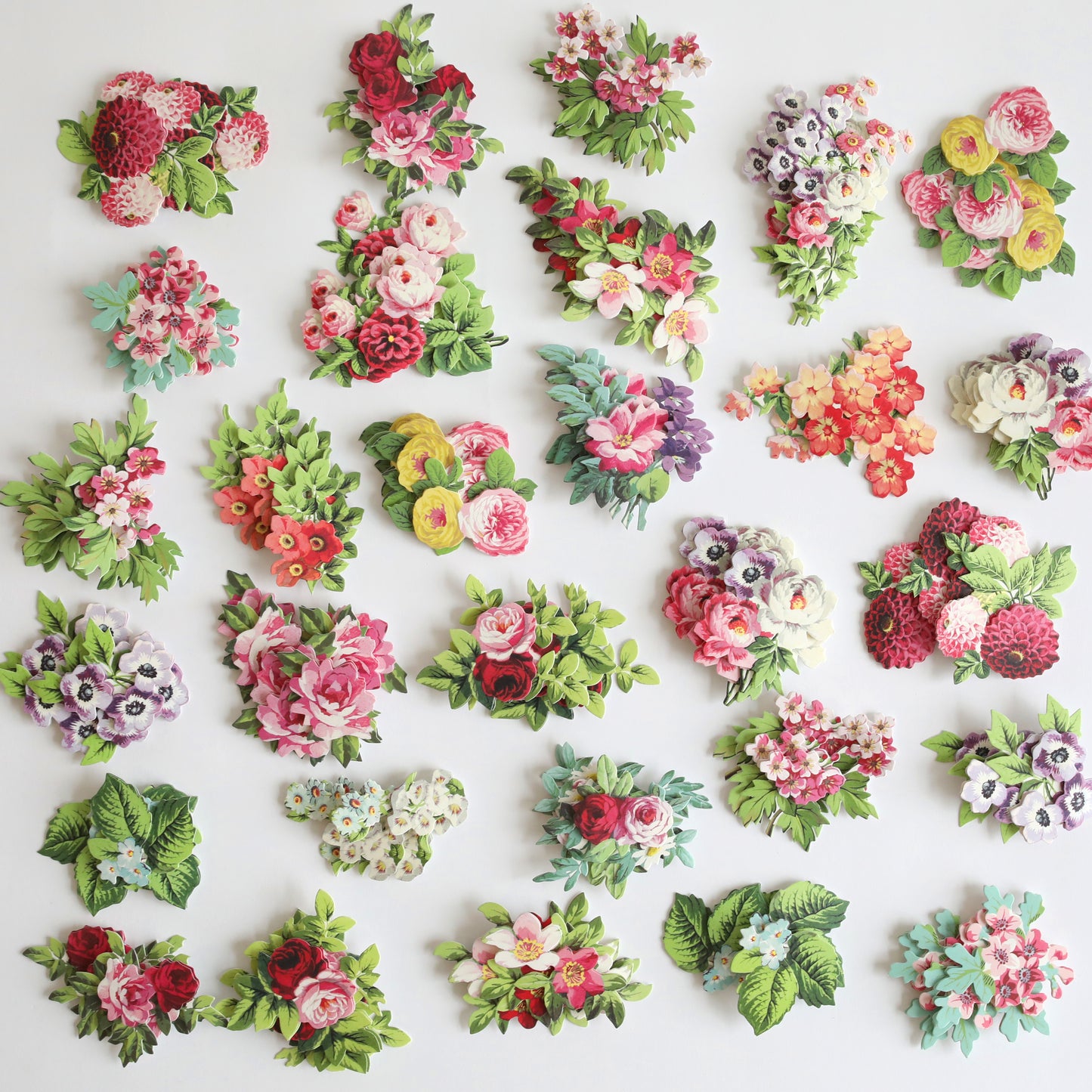 Sympathy Sentiments and Mini Flowers Stickers that are on a table.