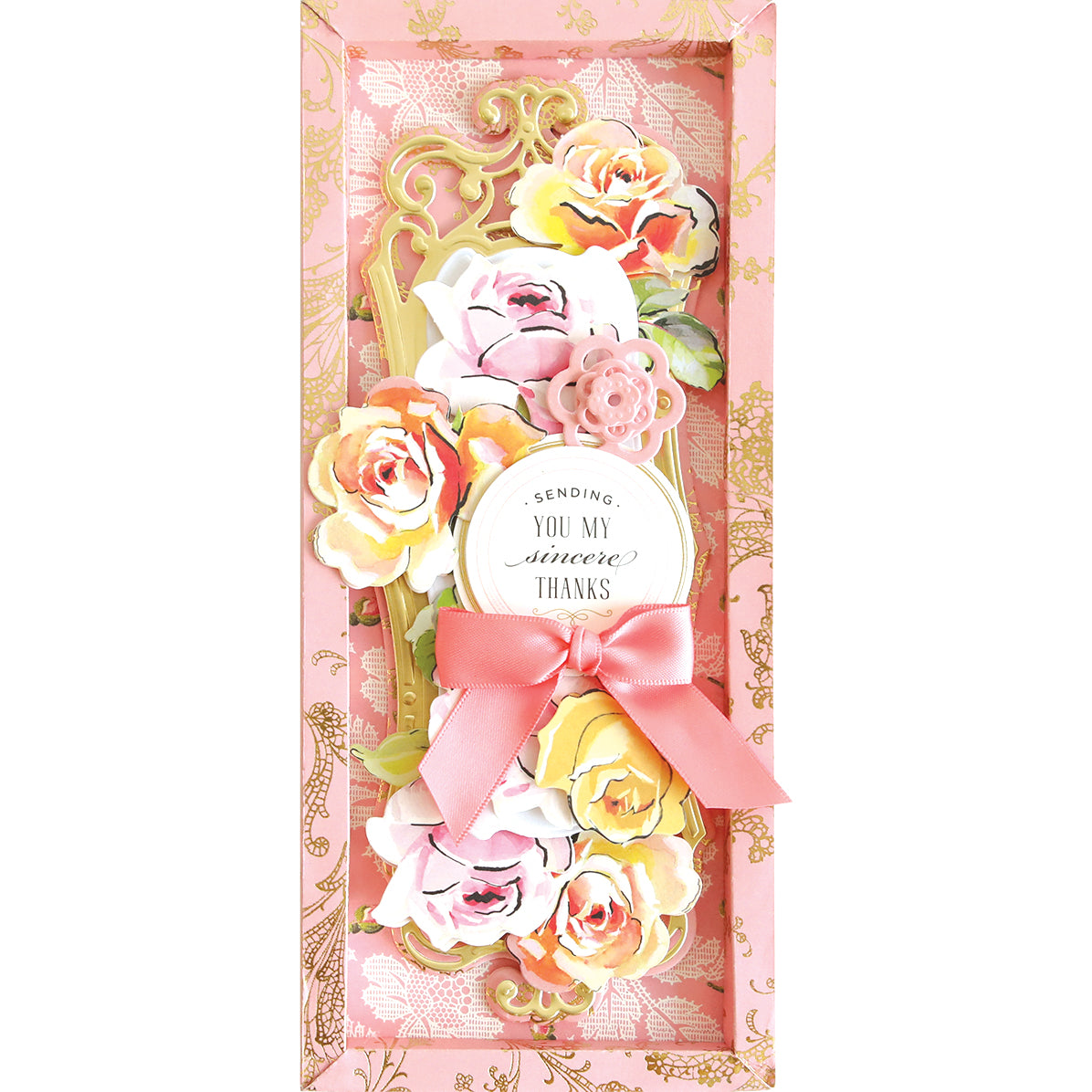 a pink card with flowers and a bow.