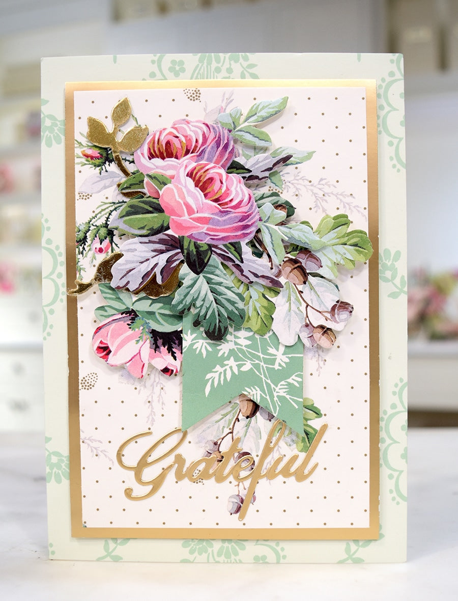 a close up of a card with flowers on it.