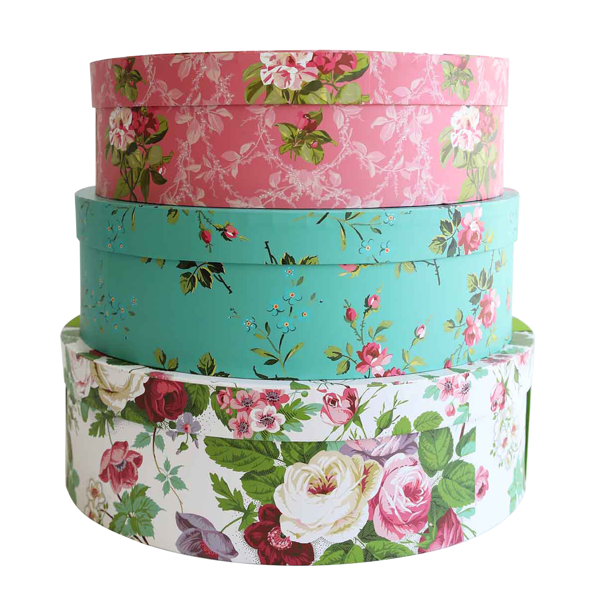 a stack of four flowered boxes sitting on top of each other.