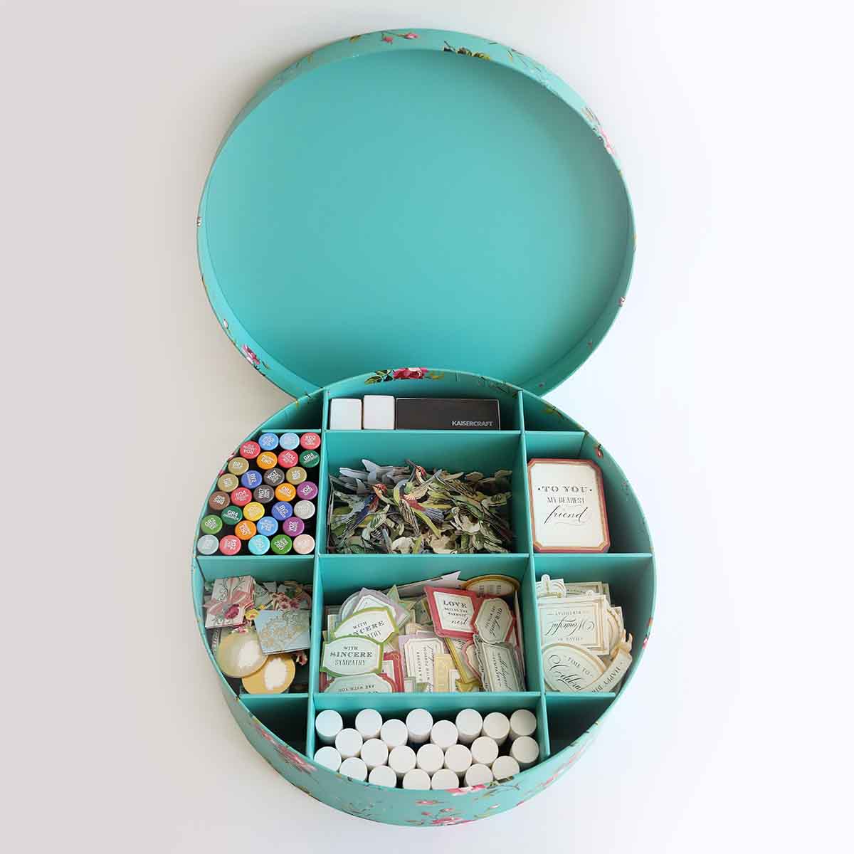a blue box filled with lots of different items.