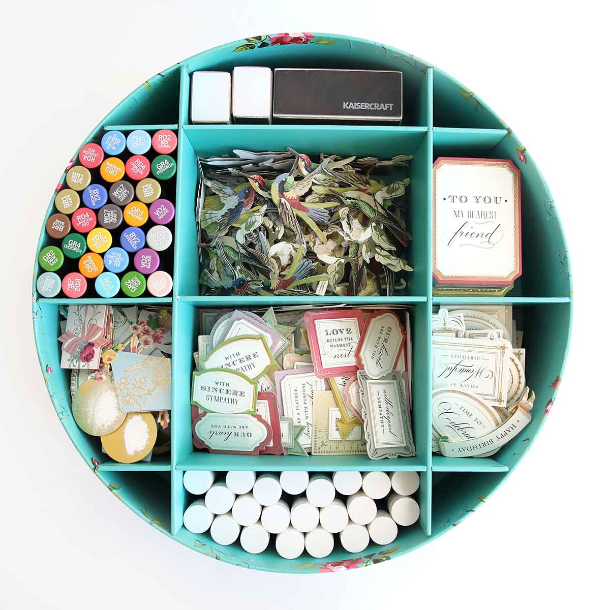 a blue container filled with lots of different items.