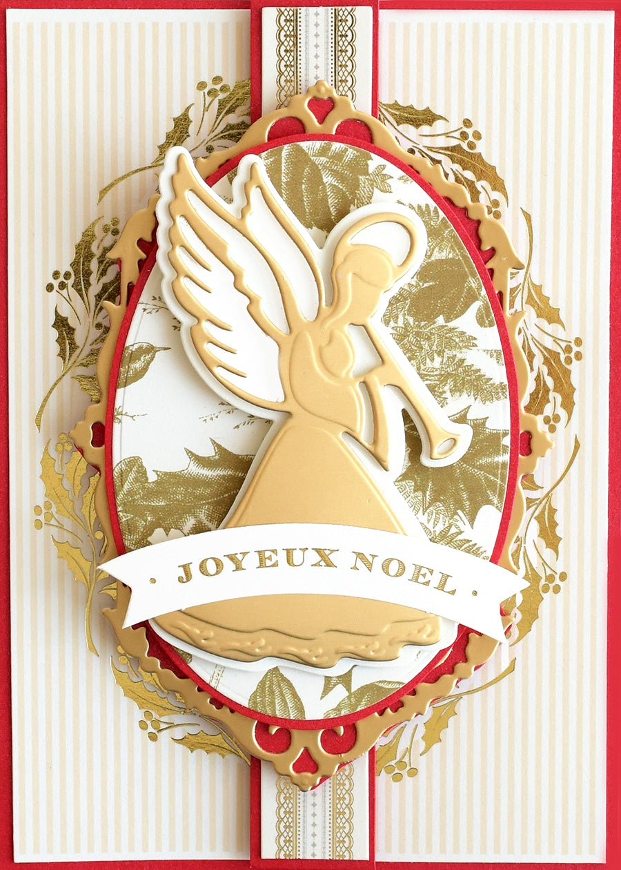 a close up of a christmas card with an angel.