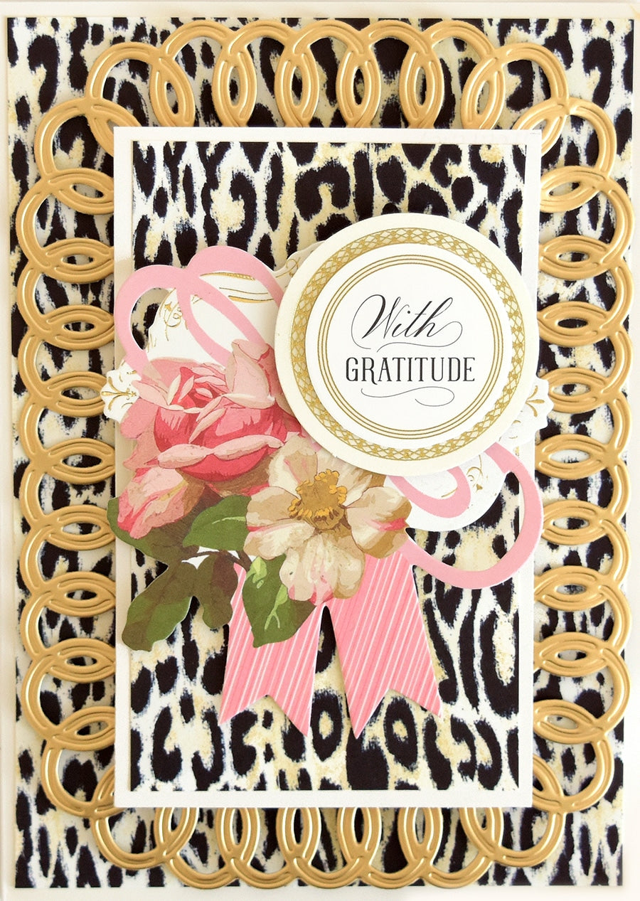 a close up of a card with a flower on it.