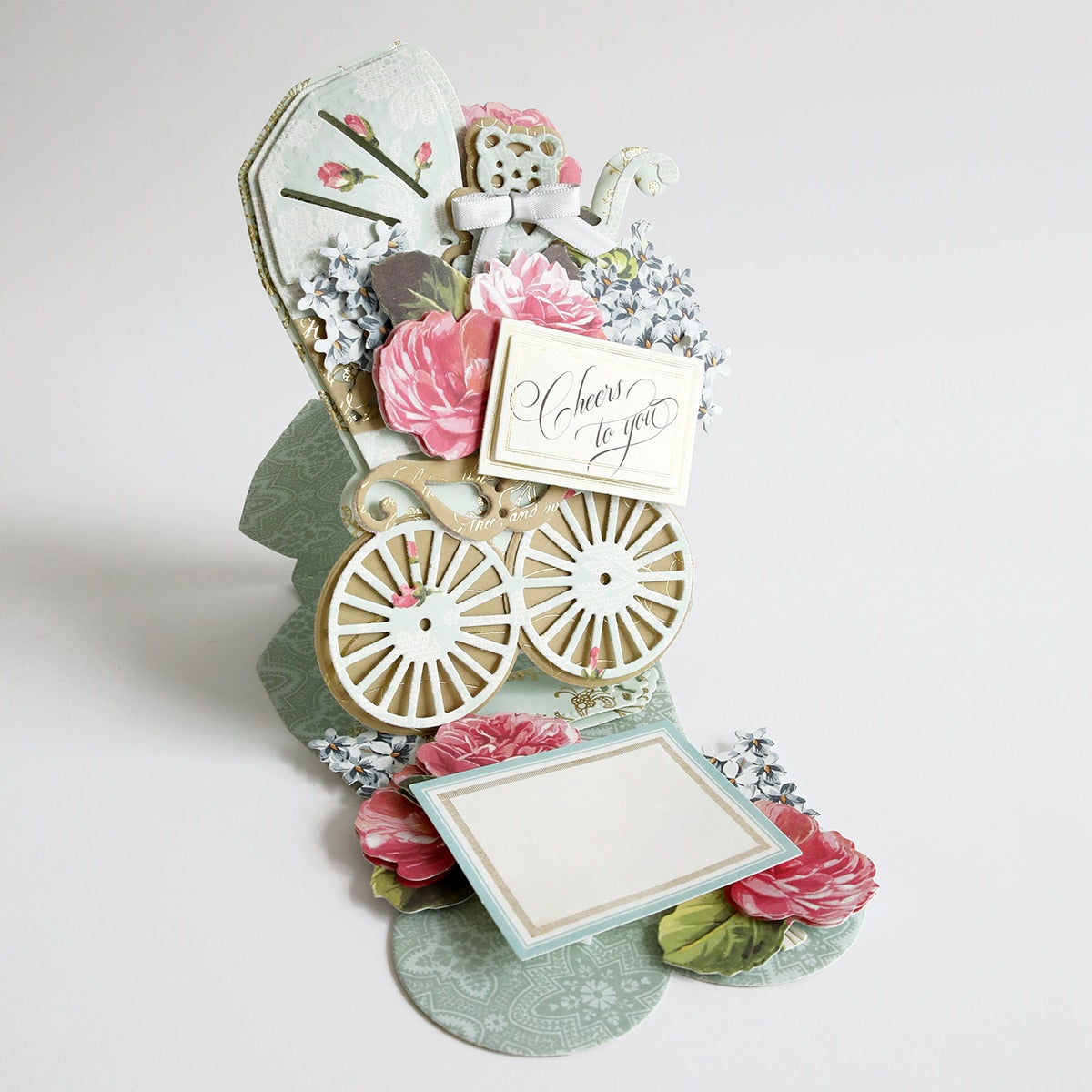 a picture frame with a baby carriage on it.