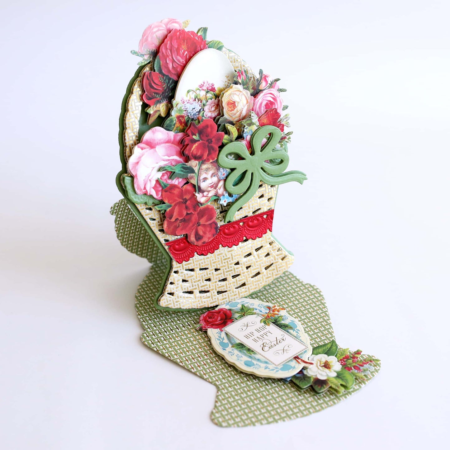 a hat with flowers and a tag on it.